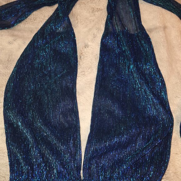 Blue shimmery romper with long tie down the back. - Picture 3 of 6